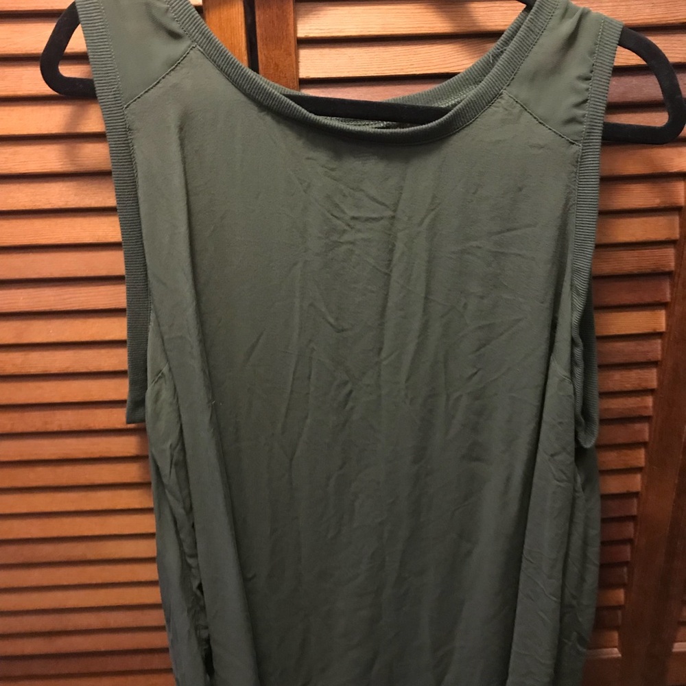 Sheer sleeveless shirt.